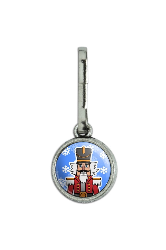 Grinning Nutcracker Soldier with Snowflakes Antiqued Charm Clothes Purse Suitcase Backpack Zipper Pull Aid