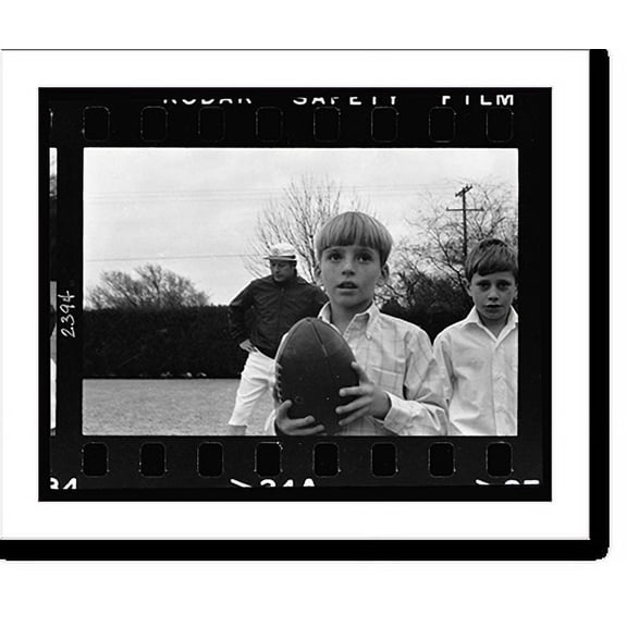 Historic Print, [Danny Mantle holding a football; father Mickey Mantle is in background].Thomas R. Koeniges., 16" x 20"