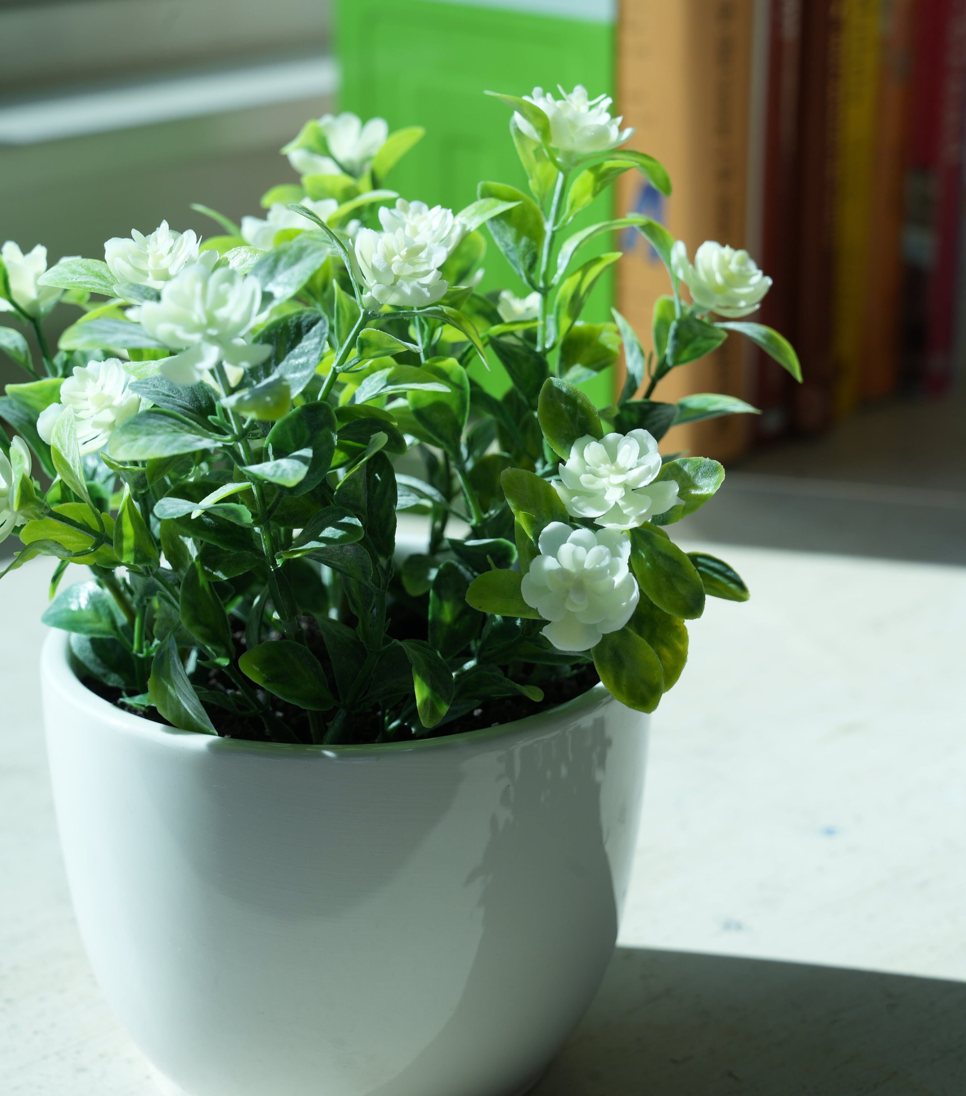 Mainstays 7.5” Artificial Eucalyptus and Flower in White Ceramic Pot Made for Tabletops – 1.1 lbs