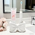 thumbnail image 1 of Bow-Shaped Toothbrush Holder with Separate Slots for Bathroom Countertop Organization, Decorative Resin Storage Rack to Keep Toothbrushes Tidy and Hygienic, 1 of 7
