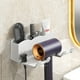 thumbnail image 1 of Soporte para secador de pelo montado en la pared - Organizador de baño adhesivo sin taladro con 3 rejillas y ganchos de almacenamiento, plástico blanco, 1 of 6