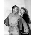 thumbnail image 2 of Rita Hayworth Helps A Lucky Soldier Into His Jacket At The Hollywood Canteen History (18 x 24), 2 of 2