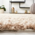 thumbnail image 4 of SAFAVIEH Martina Solid Sheep Polyester Shag Area Rug, Beige, 8' x 10', 4 of 7