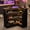Black, variant on Fnova L-Shaped Home Bar Unit with Metal Footrest, 4-Tier Corner Liquor Display Unit, Versatile Reception Desk with Storage, Black
