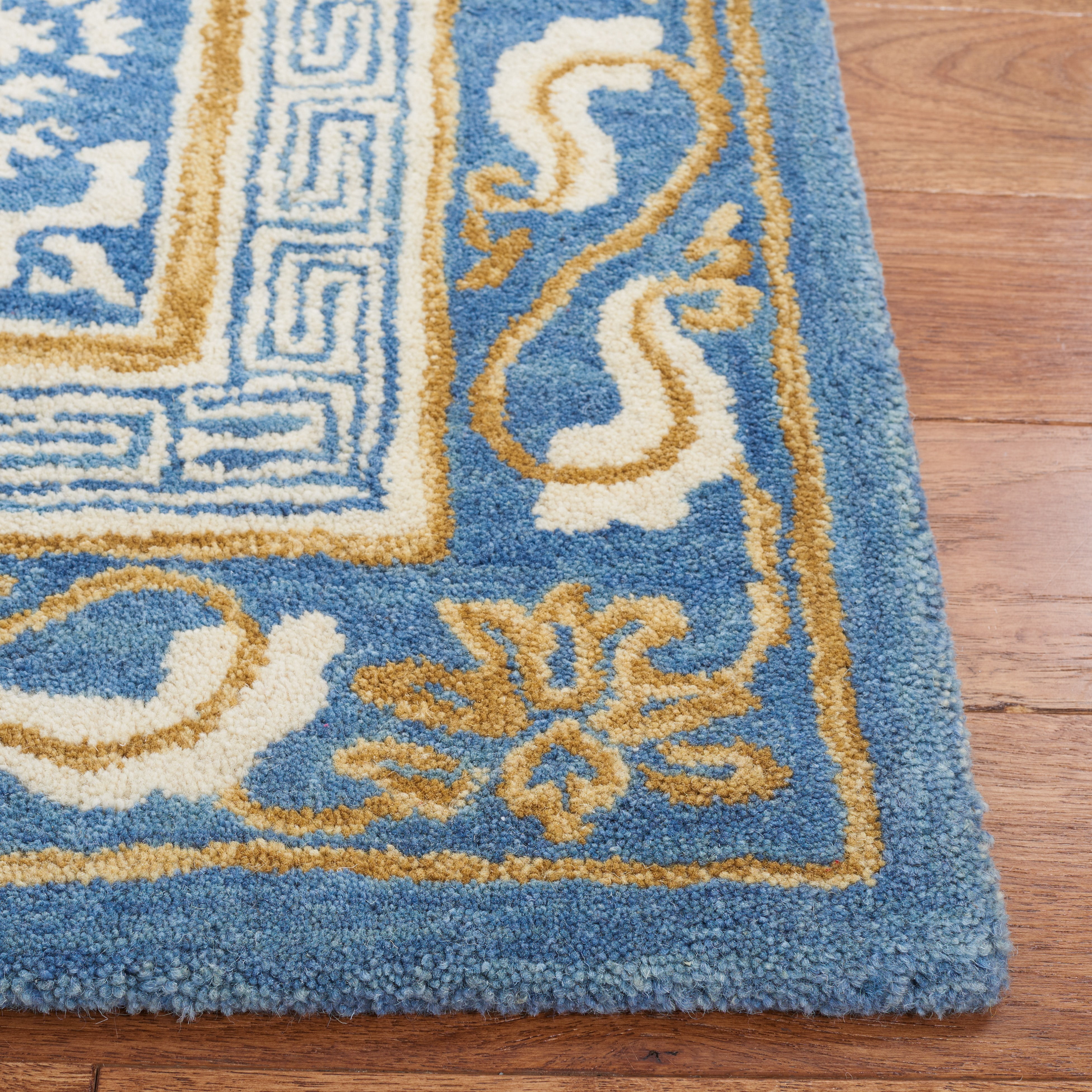 SAFAVIEH Antiquity Tiarnan Oriental Wool Area Rug, Blue/Ivory, 5' x 8'