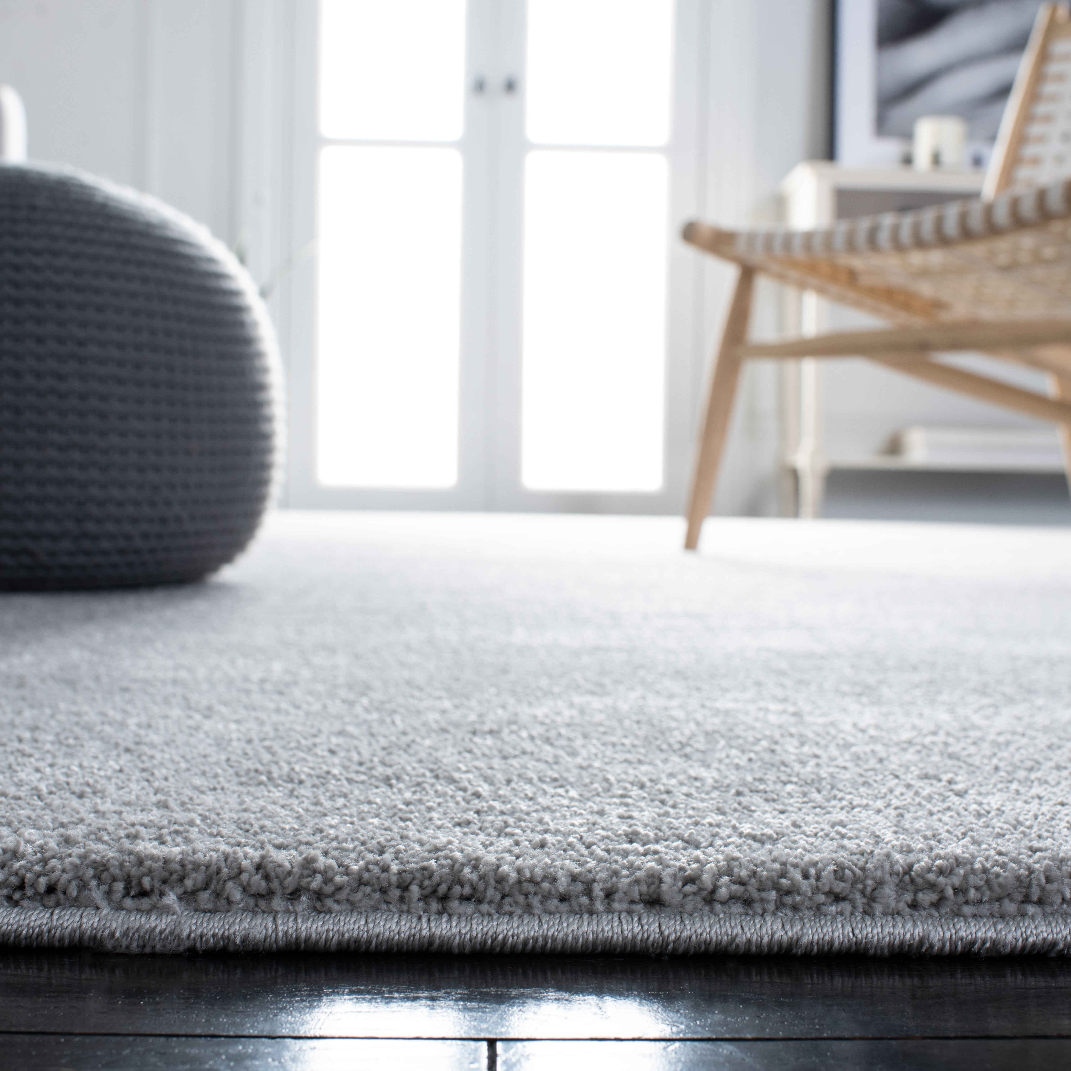 SAFAVIEH Plain and Solid Carleen Solid Plush Area Rug, Light Grey, 8' x 10'