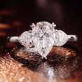 thumbnail image 2 of Oryn Jewelry 1.9 Ct Pear Cut Moissanite Ring for Women - 14K White Gold Plated Ring - Wedding Trilogy Engagement Ring - Three Stone Moissanite Ring Design, 2 of 6