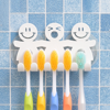 Hanging Toothbrush Holder – Smiley Face Wall Mount Toothbrush Holder – Family Toothbrush Holder with 2 Suction Cups – Silicone Mirror Organizer for 3-5 Toothbrushes – Cute and Fun Accessory