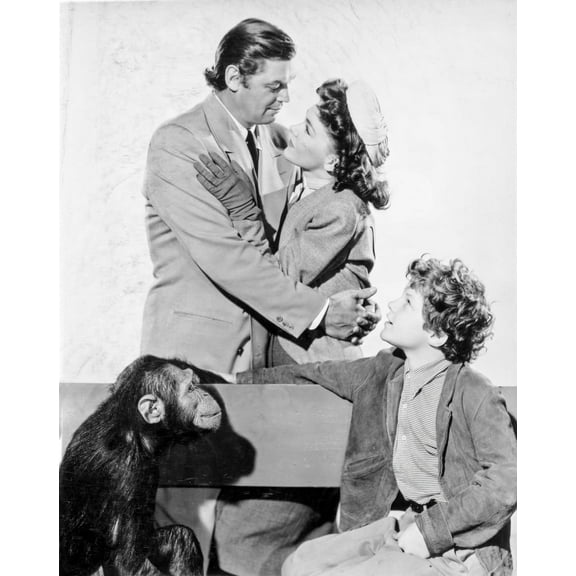 Johnny Weissmuller hugging His Wife in a Classic Movie Scene Photo Print (24 x 30)