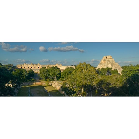 Pyramid of the Magician Mayan ruin and Pyramid of Uxmal in the Yucatan Peninsula Mexico at sunset Canvas Art - Panoramic Images (27 x 9)