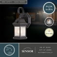 thumbnail image 2 of Wellington Aluminum 6-in. 1 Light Dusk to Dawn Medium Bronze Outdoor Wall Lantern Clear Glass, 2 of 11