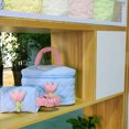 thumbnail image 4 of Organizador de artículos de tocador ligero y espacioso, perfecto para niñas: bolsa de cosméticos grande de pana en color azul claro con forma de tulipán, 4 of 5