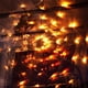 thumbnail image 4 of Halloween 96 luces LED moradas de telaraña con araña, 8 modos iluminan las decoraciones de Halloween de telaraña para interior, exterior, jardín, patio, hogar, patio (morado) Adepaton XMWJ131-1, 4 of 8