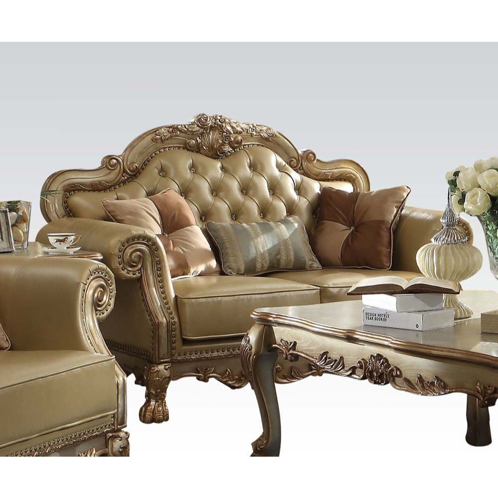 Gold Patina Faux Leather Tufted Loveseat with Nailhead Trim