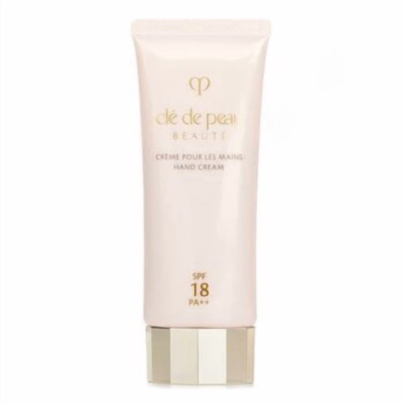 Crema de manos Cle De Peau Broad Spectrum SPF 18 Protector solar