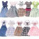thumbnail image 2 of 10 trajes de moda Barbie + 10 accesorios para muñecas., 2 of 5