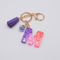 thumbnail image 1 of Hangs 2 Resin Glittering Letter Keychain with Color Stitching Flowing Design Purple Drop Glue English Character Key Chain for Daily Use, 1 of 4