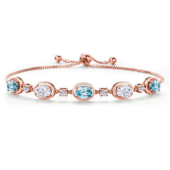 Gem Stone King 18K Rose Gold Plated Silver Blue Zircon and White Moissanite Bracelet for Women | 5.55 Cttw | Gemstone Birthstone | Oval 7X5MM | Fully Adjustable 9 inch