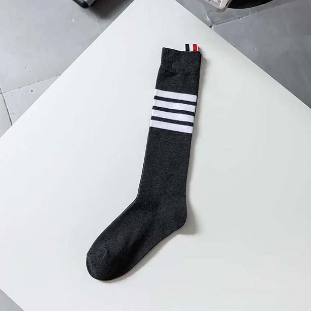 Calcetines de tubo alto Zhuji con cuatro rayas por encima de la rodilla Calcetines de tubo largos Calcetines de media pantorrilla INS de moda con etiquetas de tela