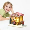 thumbnail image 4 of Mini casa de nieve navideña de resina vintage, edificios coleccionables navideños iluminados , colección de decoración navideña de para el Hugo Casa de miniaturas de resina, 4 of 9