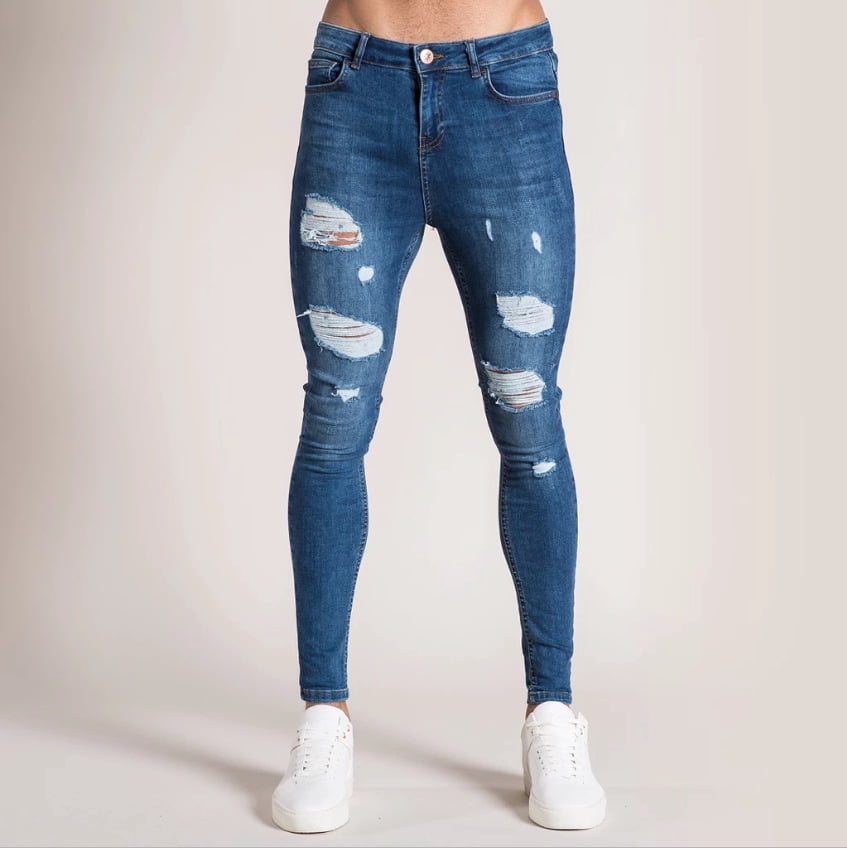 holes in paint tether jeans for men 