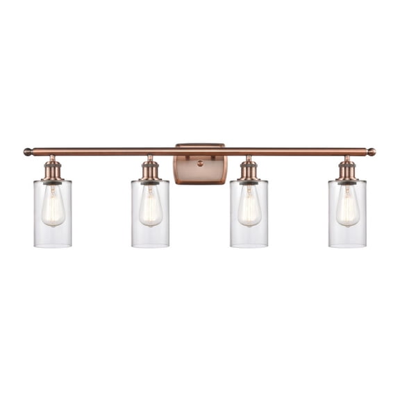 516-4W-AC-G802 Innovations Lighting Clymer - 4 Light Bath Vanity In Art Deco Style-12 Inches Tall and 36 Inches Wide-Antique Copper Finish-Clear Glass