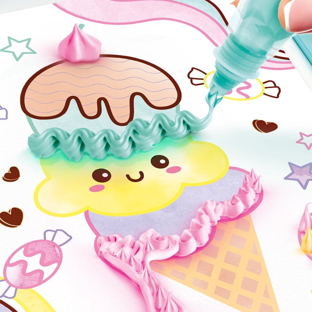 ART LAB FLUFFY PAINT STUDIO showcasing a vibrant ice cream-themed poster being decorated with 3D fluffy paint. A hand applies teal fluffy paint in a wavy pattern, while pink fluffy paint adds texture to the cone. The poster features cheerful, colourful designs, including stars, hearts, and candy illustrations. The studio includes 6 colours of 3D paint, 4 water paints, 10 posters, and various decorative elements for creative projects.