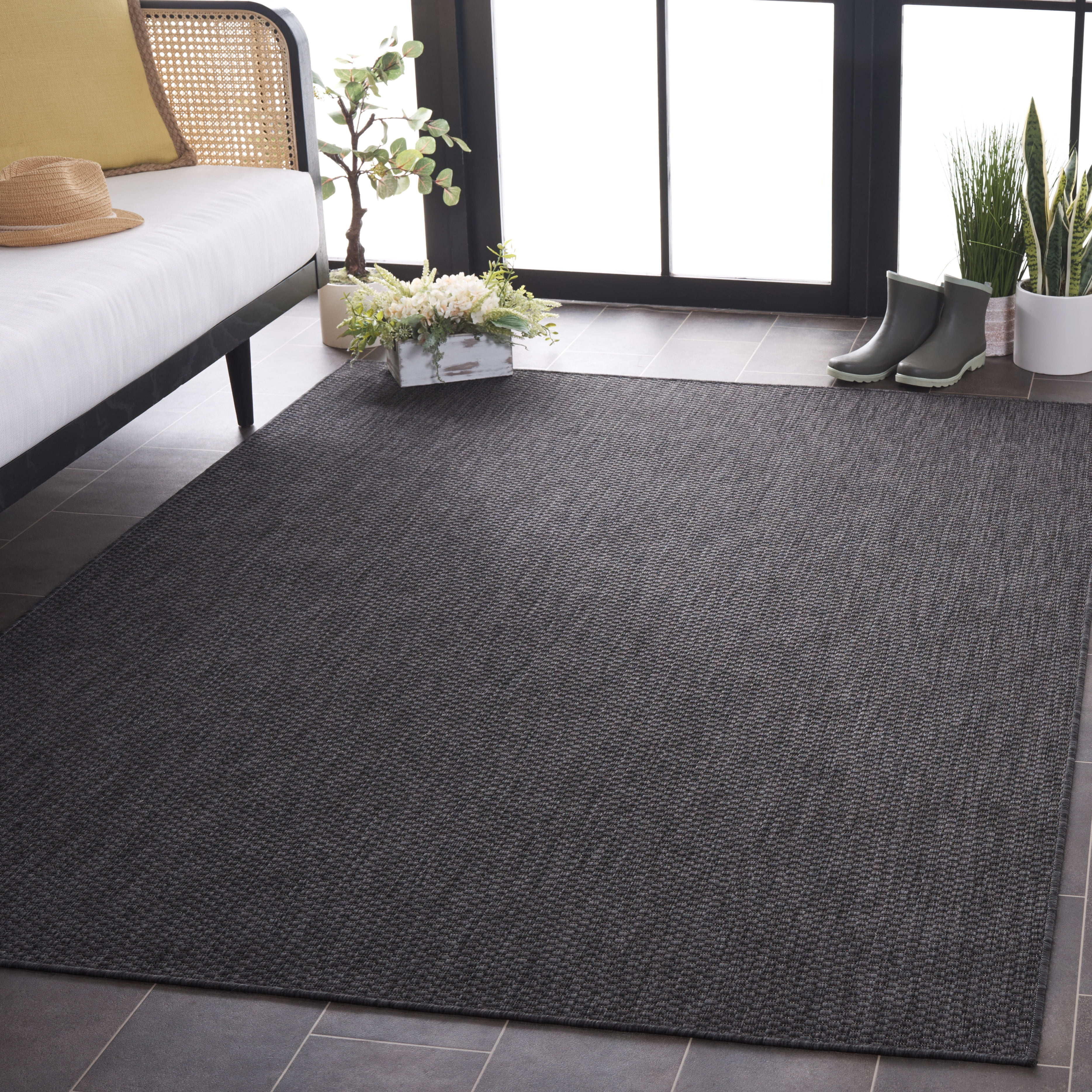 SAFAVIEH Beach House Jacinth Solid Indoor/Outdoor Area Rug, Black, 9' x 12'