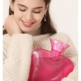 thumbnail image 4 of Llenado de una bolsa de agua caliente para mujeres, gran compresa caliente para calentar el estómago. Sincero Electrónica, 4 of 5