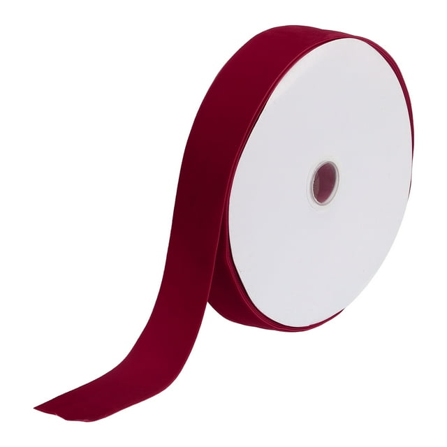 Unique Bargains Velvet Ribbon 1 1/2 Inch x 25 Yard Single Face Spool in wine red. The ribbon is made of soft velvet material, measuring 4 cm in width and 22.5 m (25 yards) in length. It is displayed on a white spool with a smooth, silky texture, ideal for DIY crafts, gift wrapping, and decorative projects.