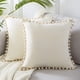 thumbnail image 1 of Fundas de almohadas decorativas, cojines de sofá estilo granja en color blanco crema con pompones, juego de 2 fundas con cremallera invisible para la decoración de la sala de estar, 1 of 5