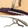 thumbnail image 1 of Cejilla para guitarra K72, cejilla con forma de rana de color bronce, aliado de Zinc, para guitarra, mandolina de ukelele, 1 of 8