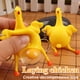 thumbnail image 1 of Divertido llavero con forma de gallina y huevos - Juguete antiestrés para adultos y niños | Diseño original de gallina amarilla poniendo huevos | Accesorio de regalo duradero de 9 x 6 cm, 1 of 5