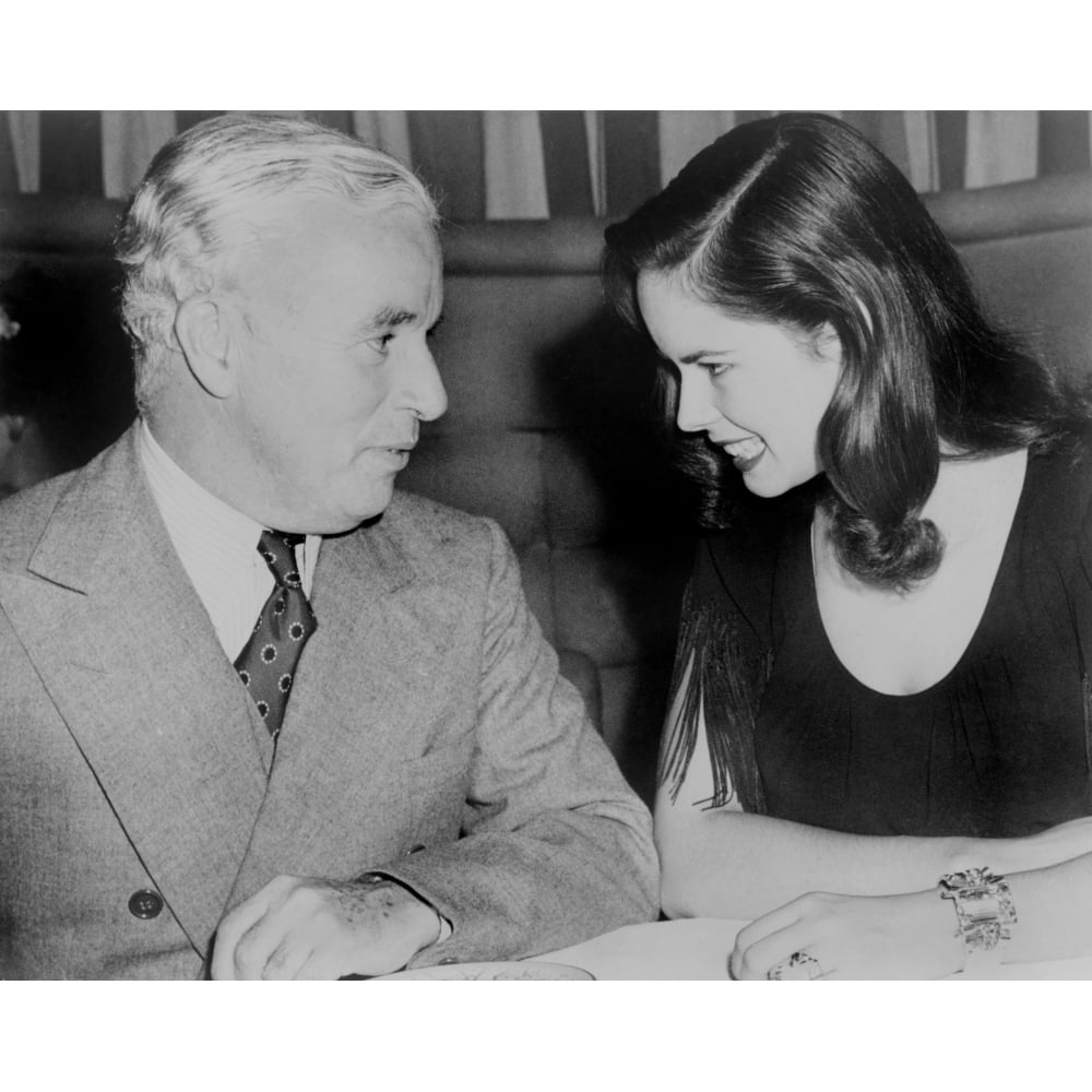 Charlie Chaplin (1889-1977) Sitting With His Young Wife Oona At ...