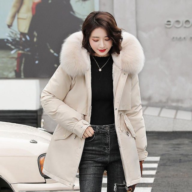 Chaqueta de algodón grueso de moda con cuello de cuero suelto de estilo coreano de invierno de mediano a largo para mujer