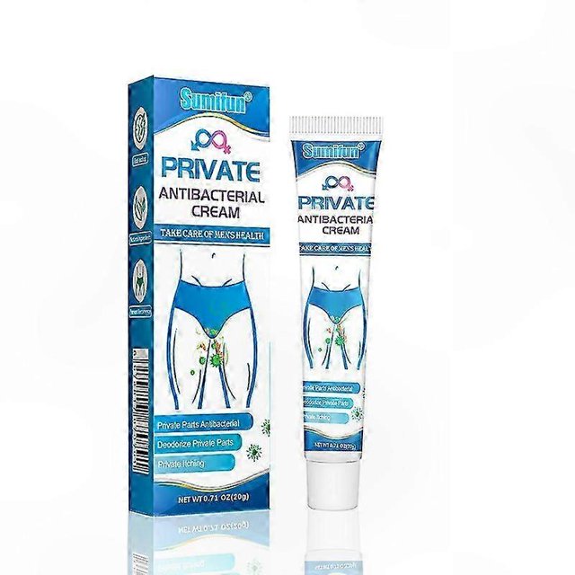 2-pack men's soothing cream, anti-bacterial intimate care ointment for skin irritation relief, topical cleansing solution — set with one white 20 g tube and matching blue-and-white box shown front-facing; box artwork shows male lower torso in blue briefs with green markers on the groin to indicate treated area, product name and antibacterial label visible on a white studio background; recomendado para cuidado íntimo y alivio de picazón leve.