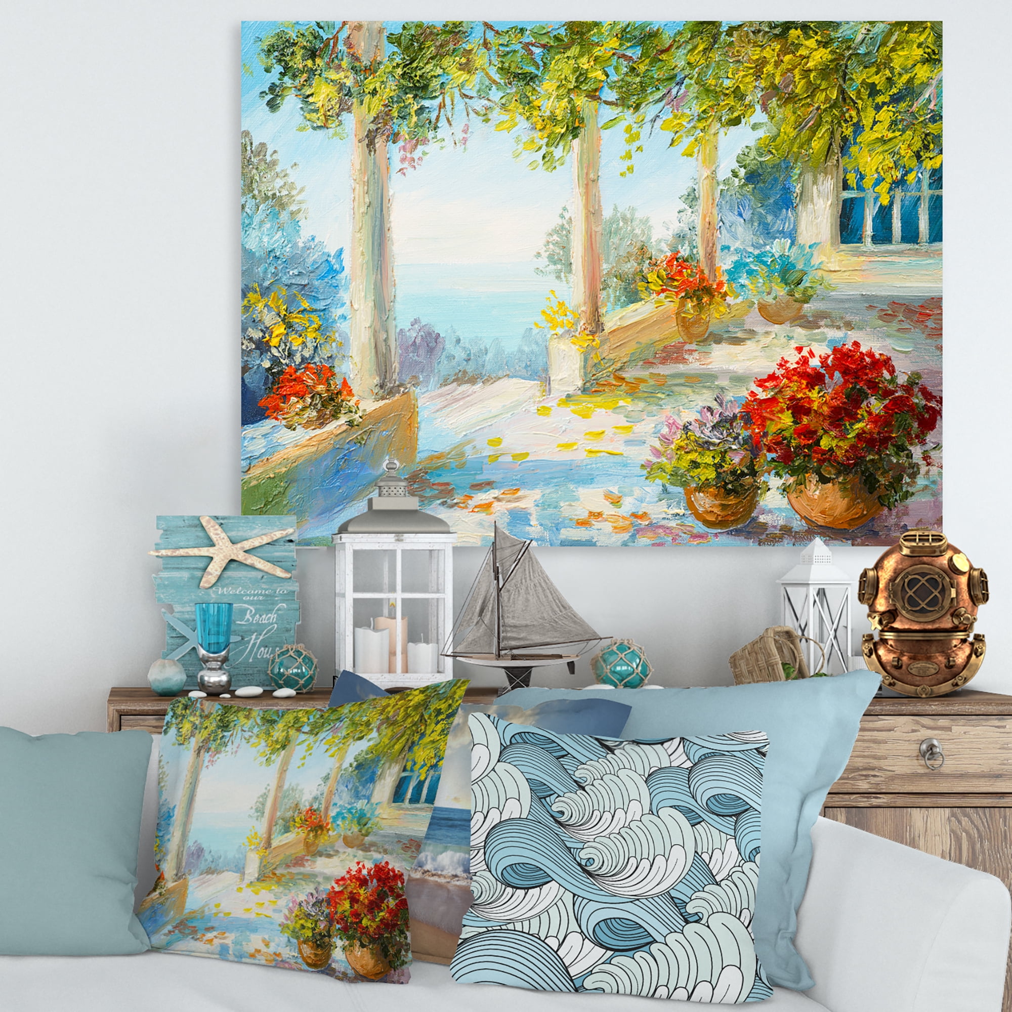 Designart ' Terrace With Red Flowers Near The Sea ' Nautical & Coastal Canvas Wall Art Print