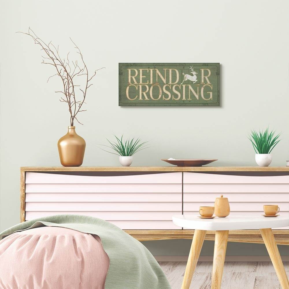 Stupell Industries Reindeer Crossing Green Holiday Christmas Word DesignCanvas Wall Art By Artist Jennifer Pugh