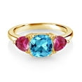 thumbnail image 2 of Gem Stone King 18K Yellow Gold Plated Silver Swiss Blue Topaz and Red Created Ruby 3 Stone Engagement Ring for Women (2.71 Cttw, Gemstone November Birthstone, Available in Size 5, 6, 7, 8, 9), 2 of 3