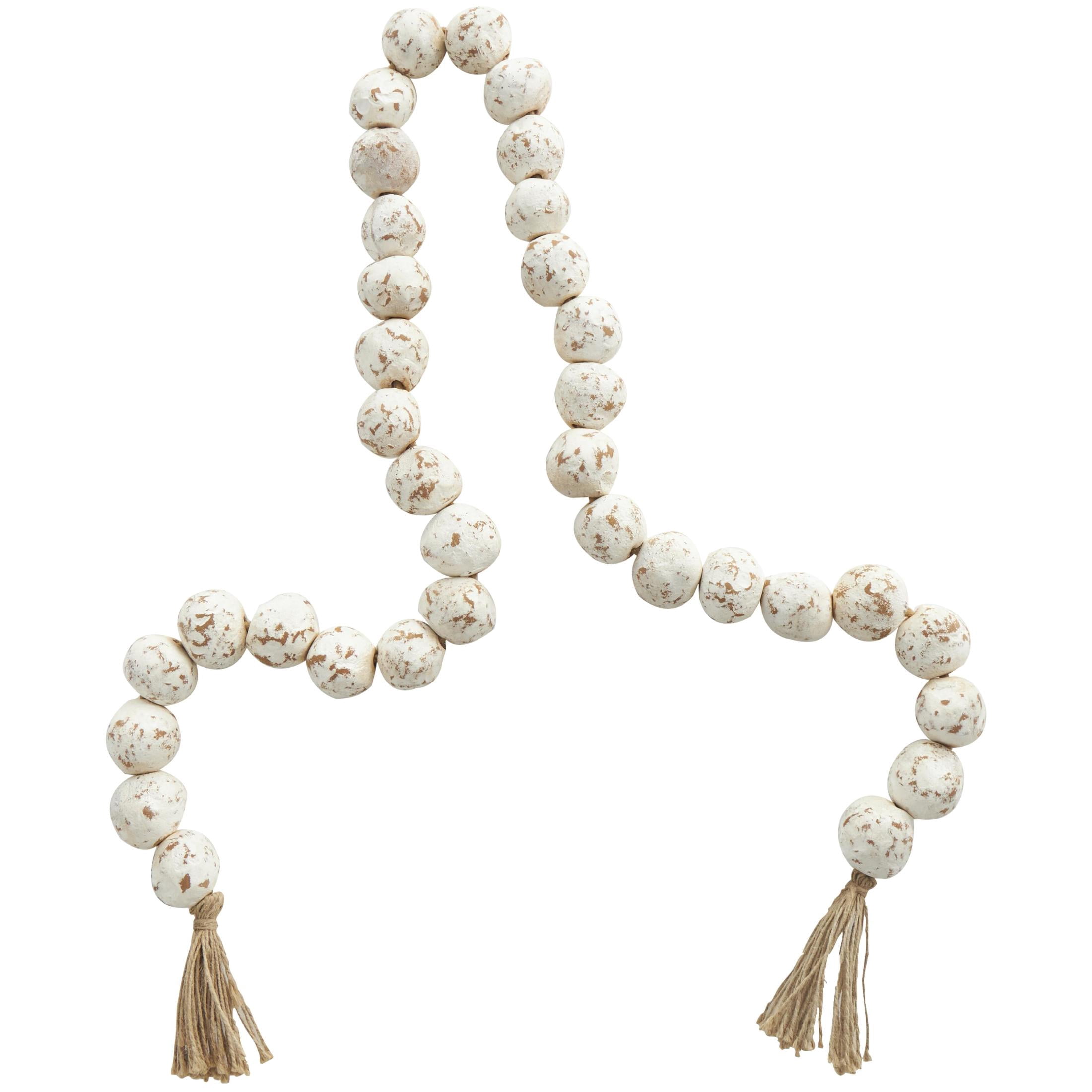 DecMode Handmade Round Intricately Shaped Large Distressed White Ceramic Garland with Tassel