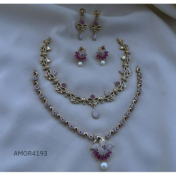South Indian Bollywood Peacock Design Gold Plated AD CZ White & Ruby Stone Pearl Flower Haaram Matte Finish Brass 2-Combo Necklace Set with Matching Drop Earrings – Bridal & Party Wear Jewelry