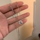 thumbnail image 1 of Collar de perlas para mujer, diseño de nicho que combina con todo, cadena de clavícula de lujo de alta gama, colgante de amor, joyería, 1 of 2