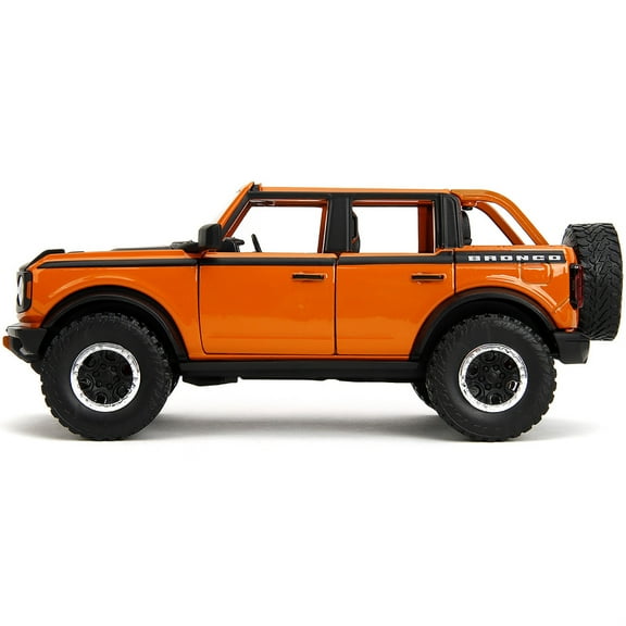 2021 Ford Bronco Open-Top Orange with Black Stripes and Hood with Extra Wheels "Just Trucks" Series 1/24 Diecast Model Car by Jada