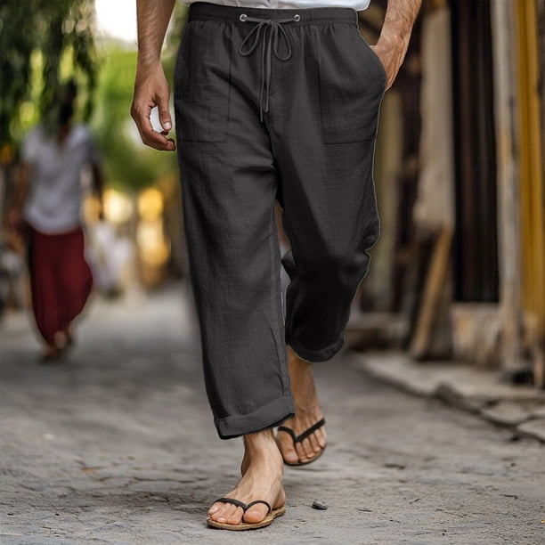 Pantalones largos de poliéster para hombre, moda masculina, color liso, informales, con bolsillos y cintura elástica y cordón ajustable.