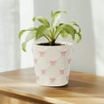 thumbnail image 2 of Mainstays 6.25" x 6.25" x 6" Round Cream and Pink Ceramic Bow Planter, 2 of 9