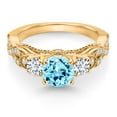 thumbnail image 2 of Gem Stone King 18K Yellow Gold Plated Silver Blue Apatite White Lab Grown Diamond and White Moissanite Engagement Ring for Women (1.28 Cttw, Gemstone, Round 6MM and 3MM, Size 7), 2 of 4