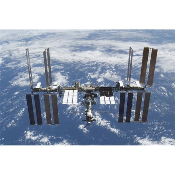 The International Space Station in orbit above Earth Poster Print