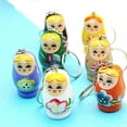 thumbnail image 4 of Naierhg 3Pcs Wood Flower Girl Painted Doll Design Matryoshka Keychain Bag Decor Pendant, 4 of 7