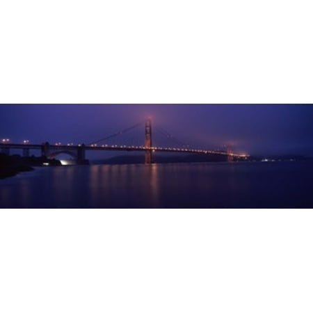 Suspension bridge lit up at dawn viewed from fishing pier Golden Gate Bridge San Francisco Bay San Francisco California USA Canvas Art - Panoramic Images (18 x (Best Pier Fishing In California)