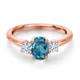 thumbnail image 3 of Gem Stone King 18K Rose Gold Plated Silver London Blue Topaz and White Moissanite Engagement Ring for Women | 1.32 Cttw | Oval 7X5MM | Gemstone November Birthstone | Size 9, 3 of 7